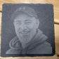 Custom portrait photo engraved on natural slate beside the original photograph